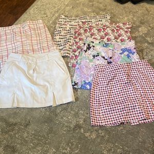 6 IZOD  ladies golf skorts.